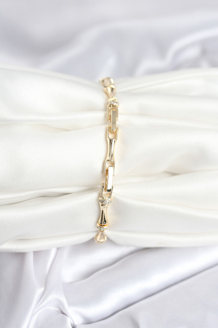 Pirinç Gold Renk Kemik Model Zirkon Taşlı Kadın Bileklik