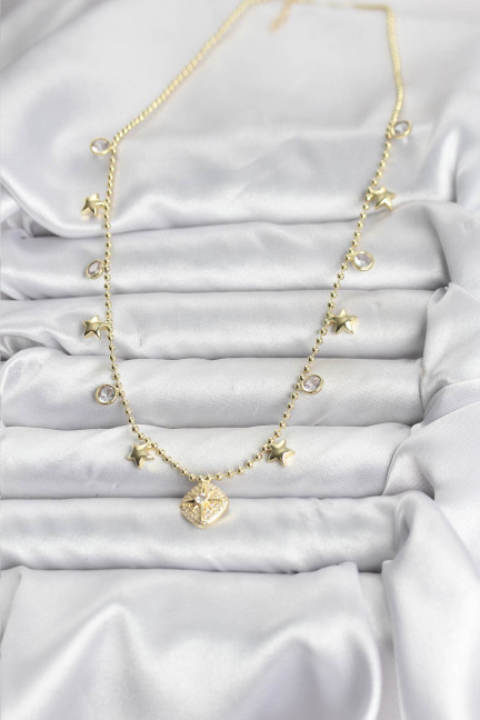 Pirinç Gold Renk Zirkon Taşlı Kutup Yıldızı Model Kadın Kolye